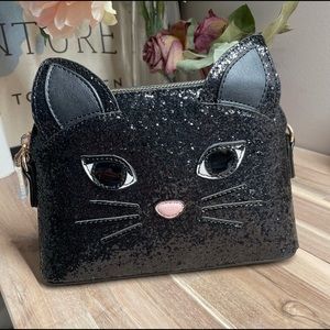 Kitten mini handbag poppy&peonies brand. New in original packaging.